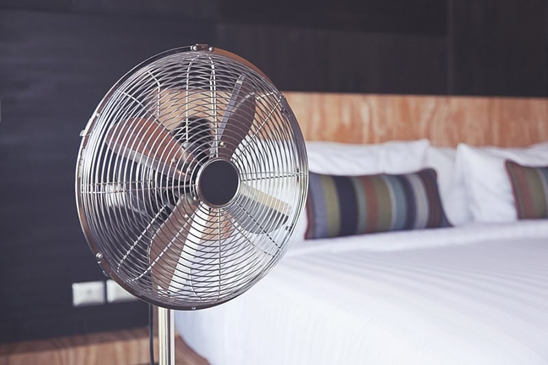 Electric Fan in a bedroom improving indoor air quality